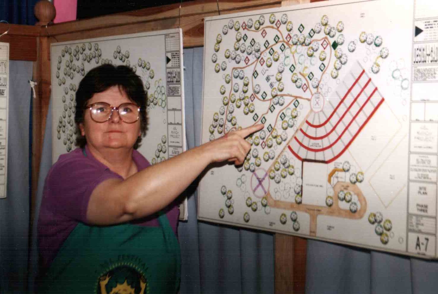 Linda Cummings, long-time ASL Ranch coordinator, show 1995 concept sketches. Credit: Suzy Best